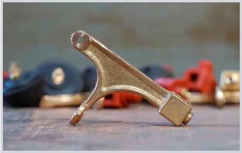 Gatillos de bronce Crossio